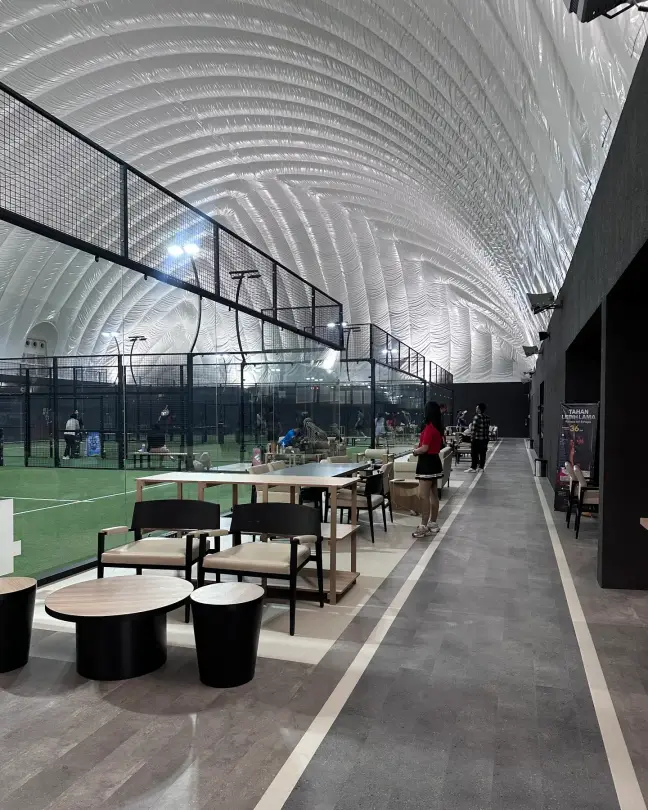 Lounge seating beside the courts